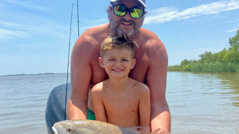 Thomas and Chad with a redfish