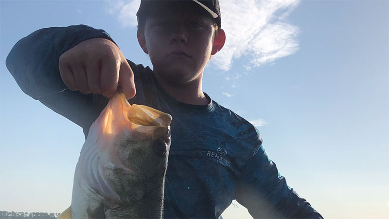 Ruger Jase Warren with a 5-pound bass caught at Caney Lake in Jonesboro on July 10, 2023.