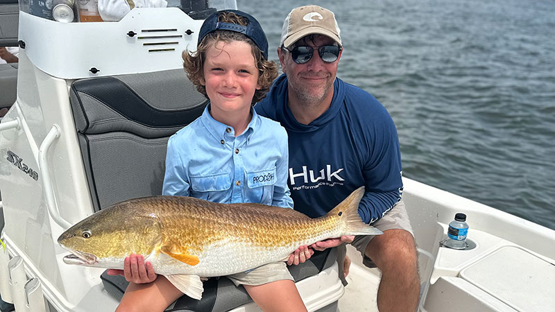 Grayson Schwartz, 8, with a big red caught out of Port Sulphur on June 26, 2023.