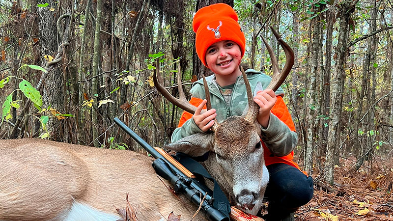 Eight-year-old Aubree Langford of Lake Charles shot her first deer, this 8-point, with a 243 rifle in Sabine Parish on Nov. 18, 2023.