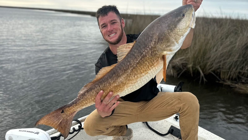 Casey Eshleman caught this whopper 35-inch bull red using a croaker on Jan. 10 in Hopedale.