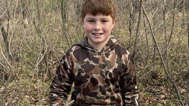 Chandler Crews, 8, harvested this 8-point while hunting with his grandpa, Harlan.