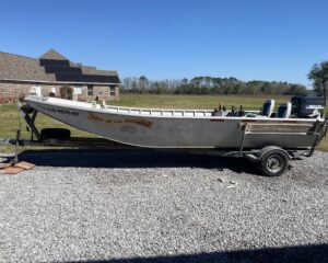 20 foot Solid fabrication boat. Sturdy. Engine runs great.