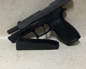 Sig p320 full size up for trading looking for Mossberg 12 gauge or other guns