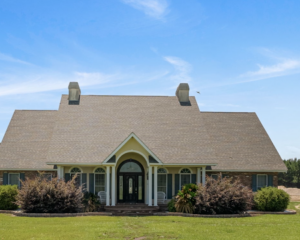 Home For Sale in Columbia, MS on 58 Acres with 7 Acre Pond