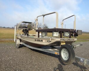 Prodrive boat motor and trailer for sale for bowfishing or hunting.