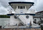 Steel hull self-propelled houseboat
