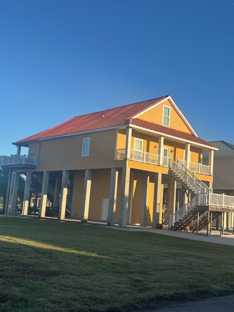 **REDUCED** $750,000: Waterfront Fishing Camp in Shell Beach (Fort Beauregard Subdivision)