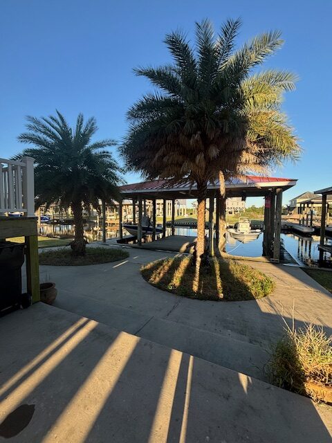 **REDUCED** $750,000: Waterfront Fishing Camp in Shell Beach (Fort Beauregard Subdivision)