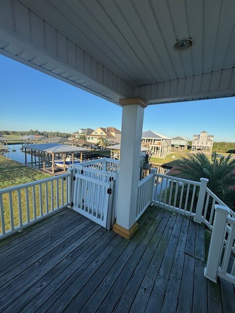 **REDUCED** $750,000: Waterfront Fishing Camp in Shell Beach (Fort Beauregard Subdivision)