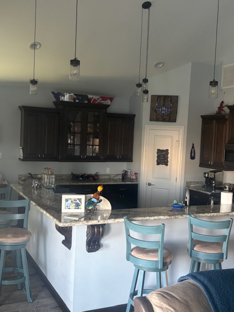 **REDUCED** $750,000: Waterfront Fishing Camp in Shell Beach (Fort Beauregard Subdivision)