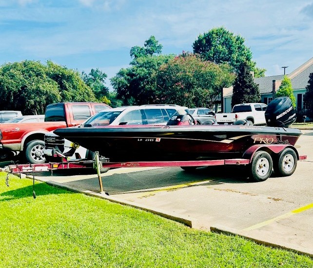 2008 Tracker Pro Craft 200 Boat, 200 Optimax Motor, and 2008 TSTL Trailer