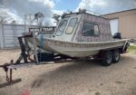 #101 • 20′ HEAVY-DUTY 2003 ALUMINUM CABIN BOAT WITH 90HP SUZUKI
