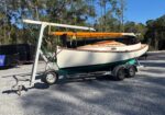 4.30.26 | #9545 • GRIMMALKIN – 18′ FENWICK WILLIAMS CLASSIC WOODEN CATBOAT w/ TRAILER