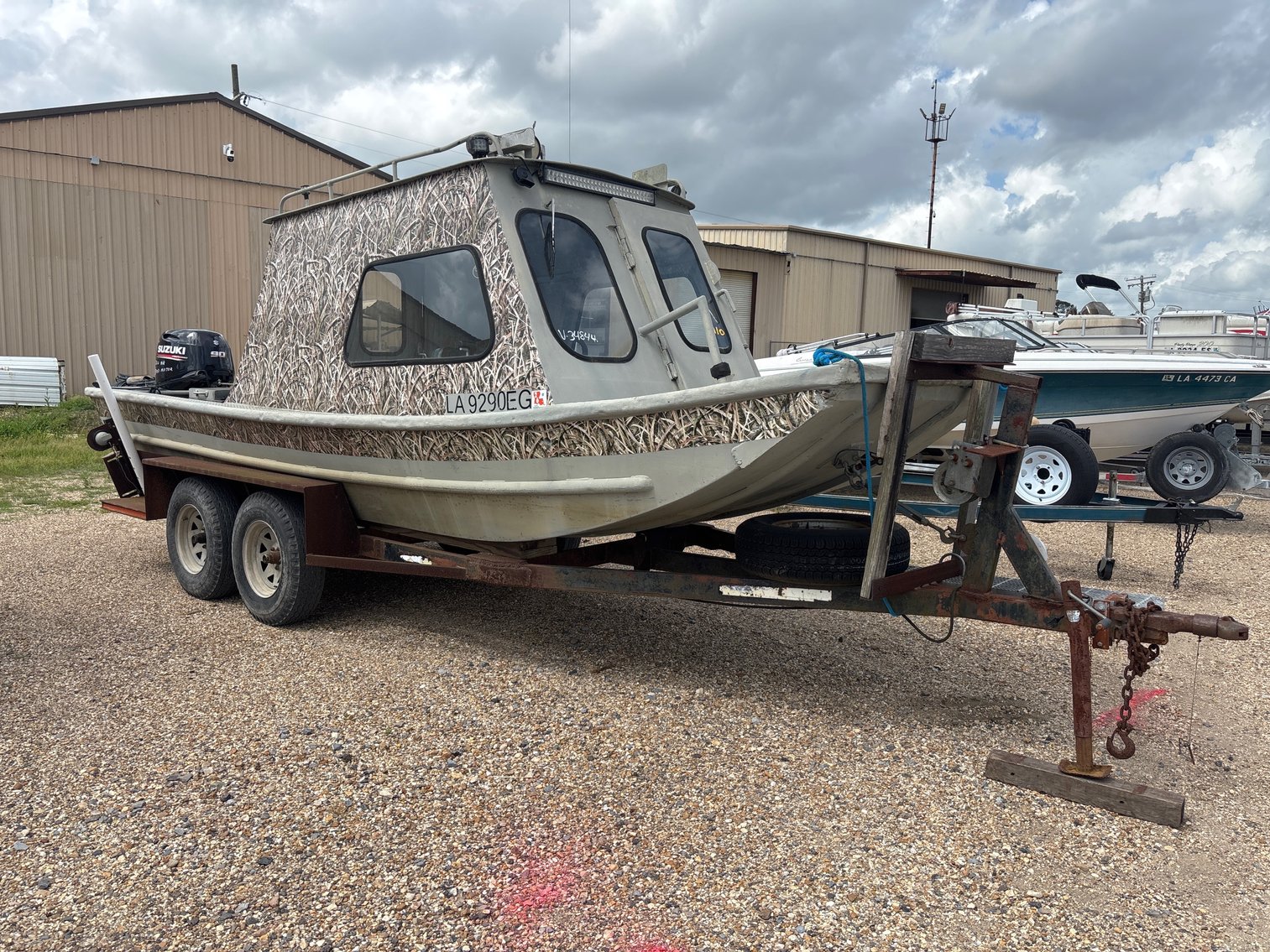 #101 • 20′ HEAVY-DUTY 2003 ALUMINUM CABIN BOAT WITH 90HP SUZUKI