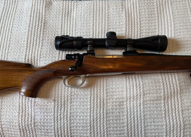 300 Win Mag Rifle & 12 Gauge Shotgun