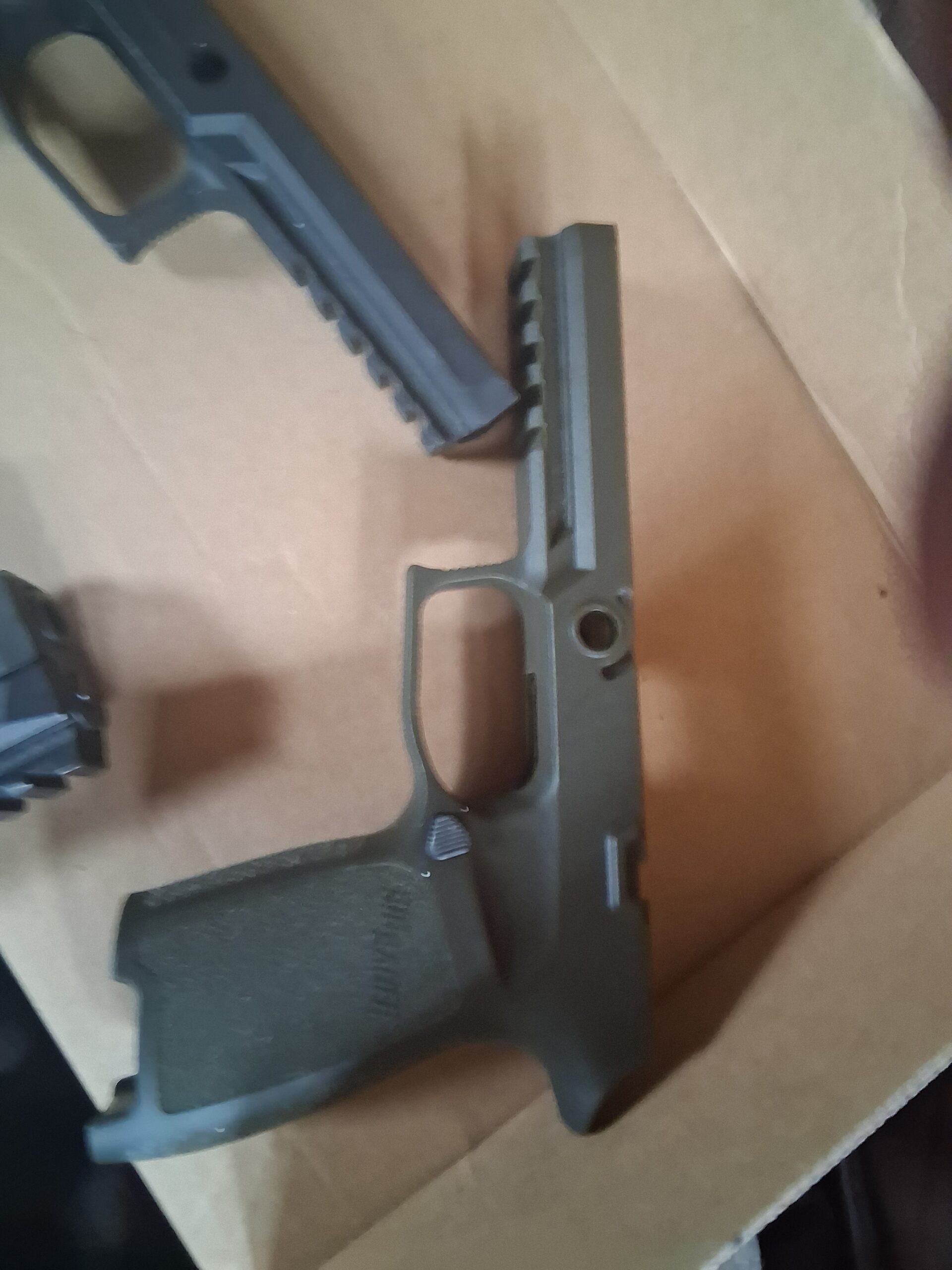 Wanted two AR-15 lowers complete no cheap junk please trade for new Sig Sauer 320 full size 317 round magazines Wilson Combat frame it’s a modular system also comes with a green Sig frame and a black original Sig lower frame sell 600 or trade for two lowers