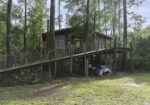 1.98 Acre Waterfront Double Lot in Slidell with Two-Story Boat Dock, Lift, and Much More!
