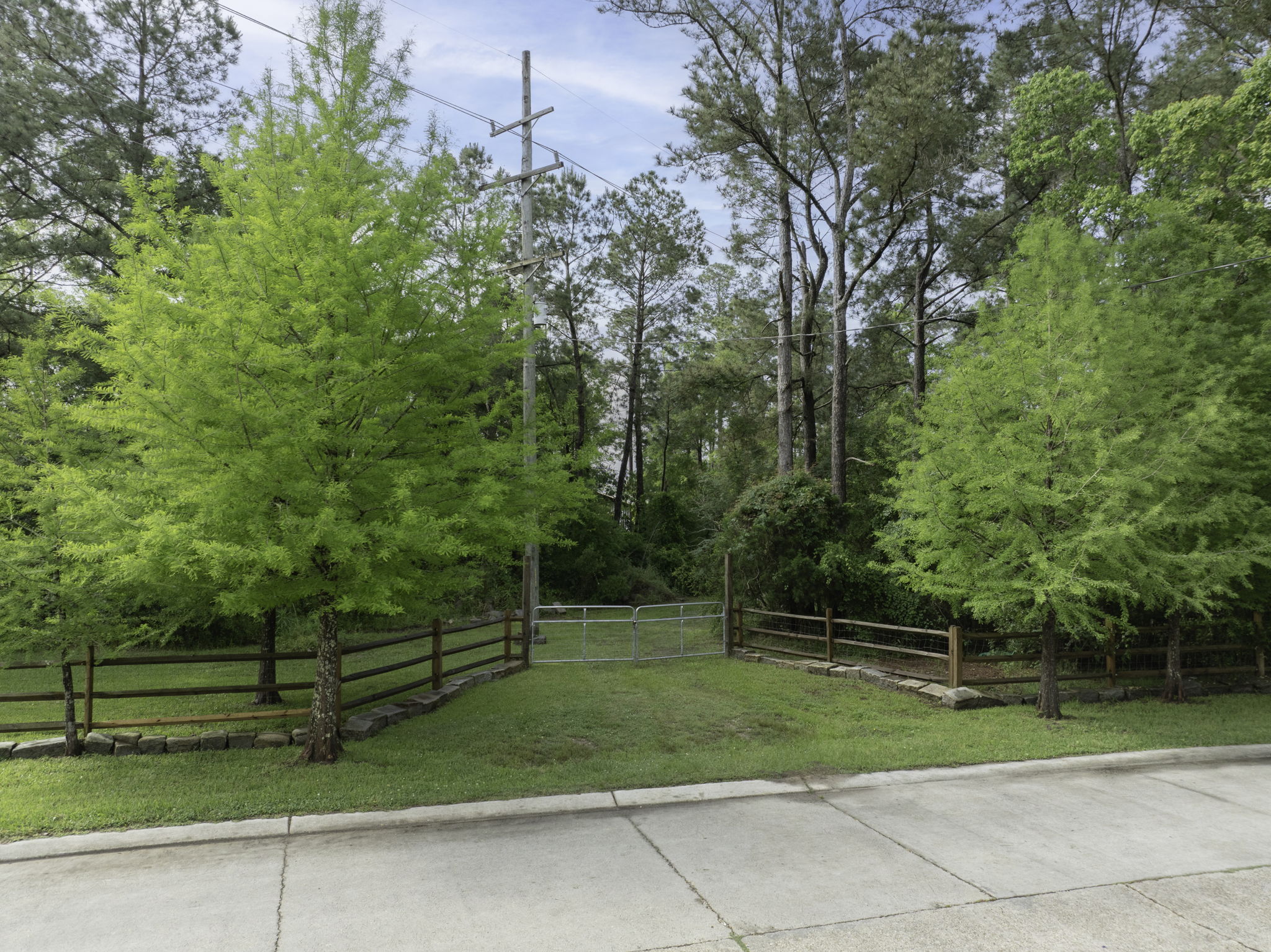 1.98 Acre Waterfront Double Lot in Slidell with Two-Story Boat Dock, Lift, and Much More!