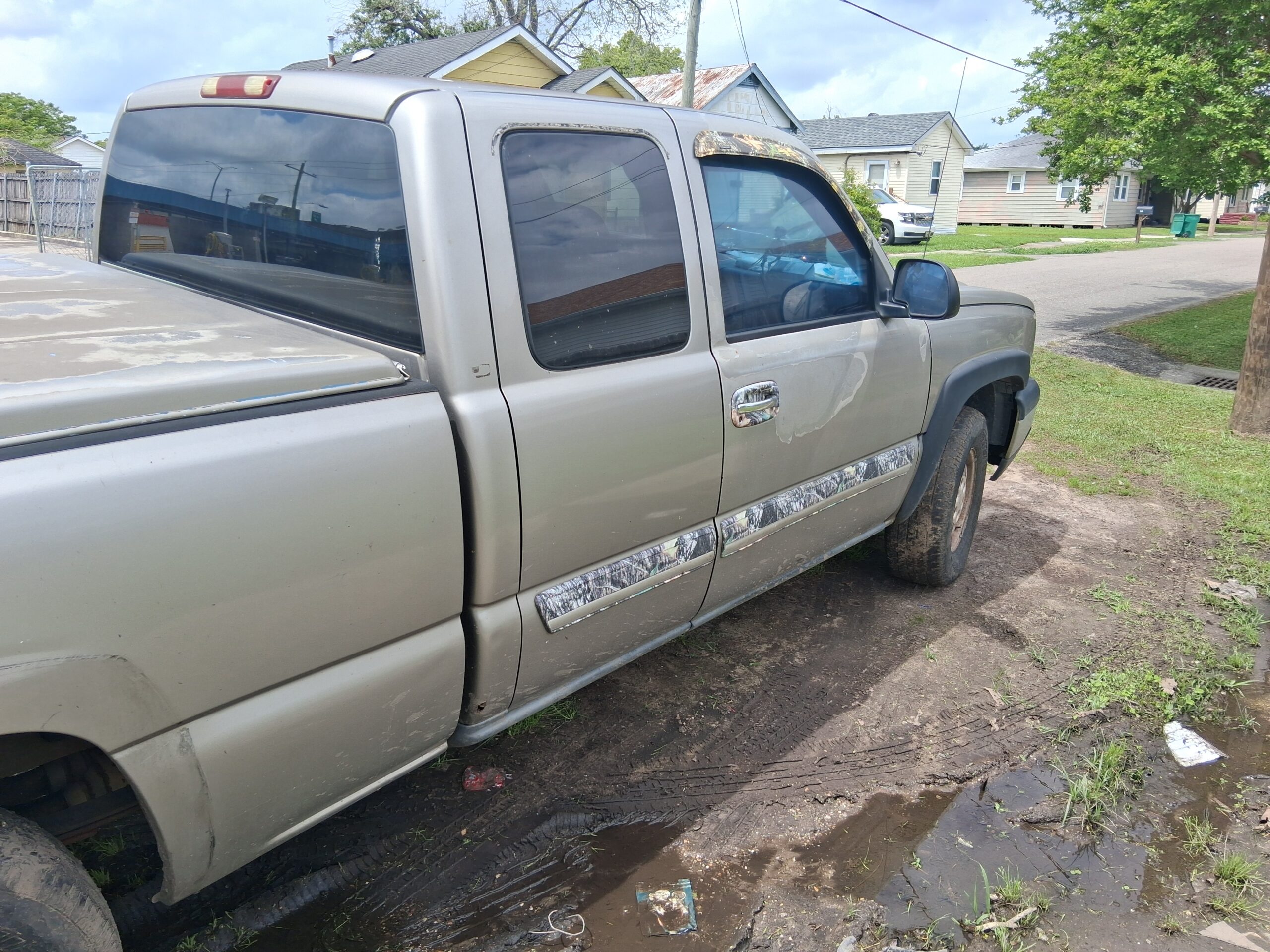 03 Chevy Z71 with 5.3 170,000 Mi original AC runs great needs nothing but a driver very very very dependable sell or trade for van or? Has lid on back