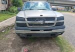 03 Chevy Z71 with 5.3 170,000 Mi original AC runs great needs nothing but a driver very very very dependable sell or trade for van or? Has lid on back