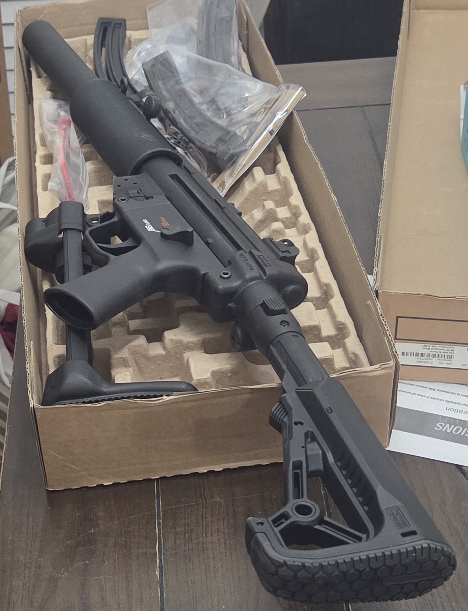 K&K MP5 22LR NIB. NEVER SHOT. DID INSTALL $200 FOLDING STOCK AND COMES WITH THREE MAGAZINES. $750