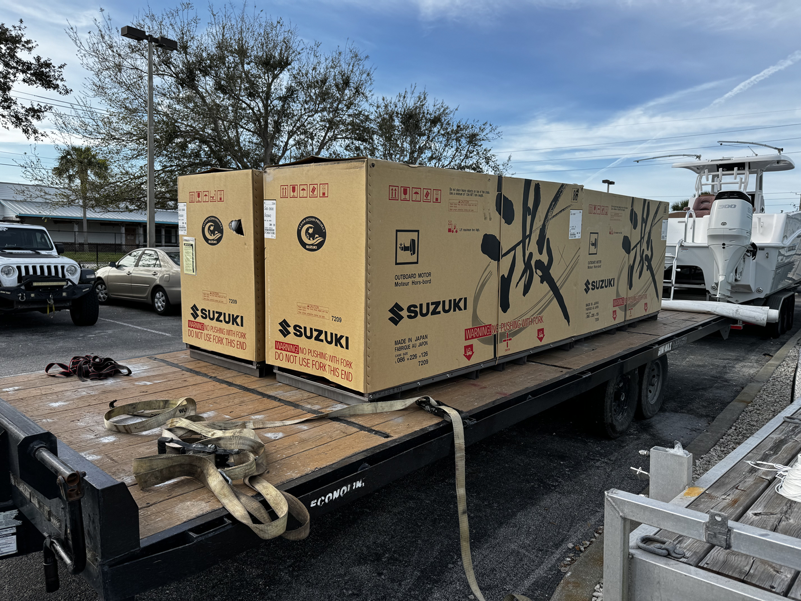 Quad 2024 Suzuki 350 outboard motors (new, still in crate)